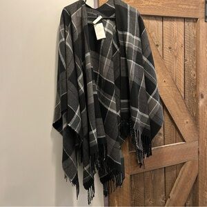 NWT. Black, Grey and White Plaid Fringe Poncho